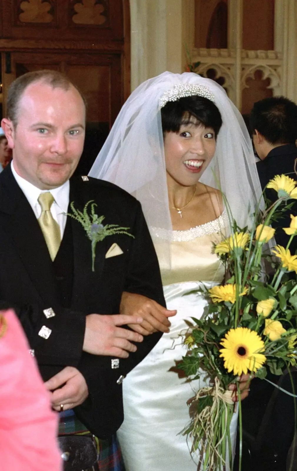 Surprised looks from the couple, from Hamish and Jane's Wedding, Canford School, Wimborne, Dorset - 5th August 1998