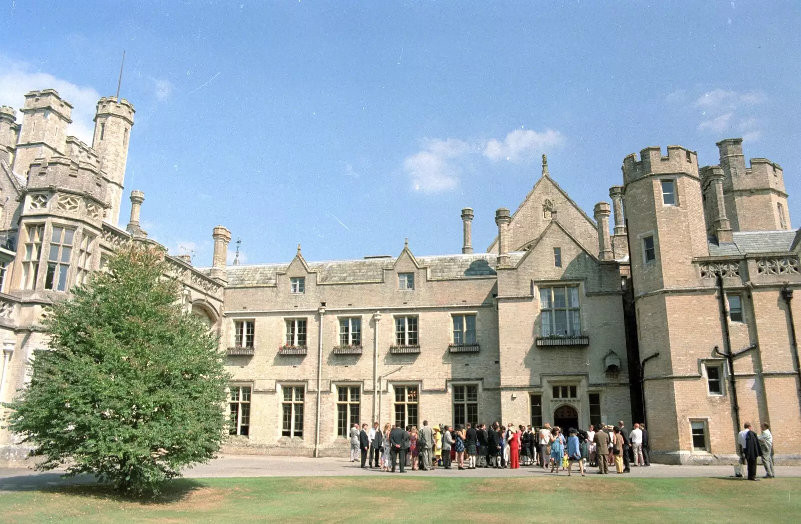 Guests mill around outside Canford School, from Hamish and Jane's Wedding, Canford School, Wimborne, Dorset - 5th August 1998