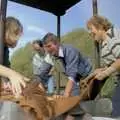 Folding up the hessian around the apples, Cider Making With Geoff and Brenda, Stuston, Suffolk - 10th September 1998