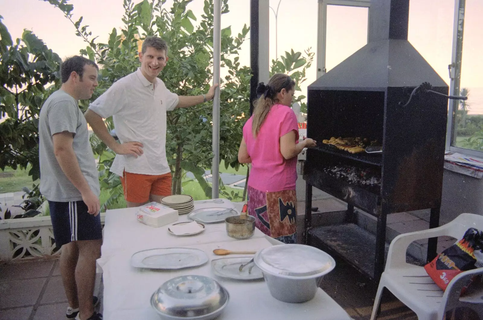 Jon gets excited about an imminent barbeque, from The CISU Massive do Malaga, Spain - November 14th 1998