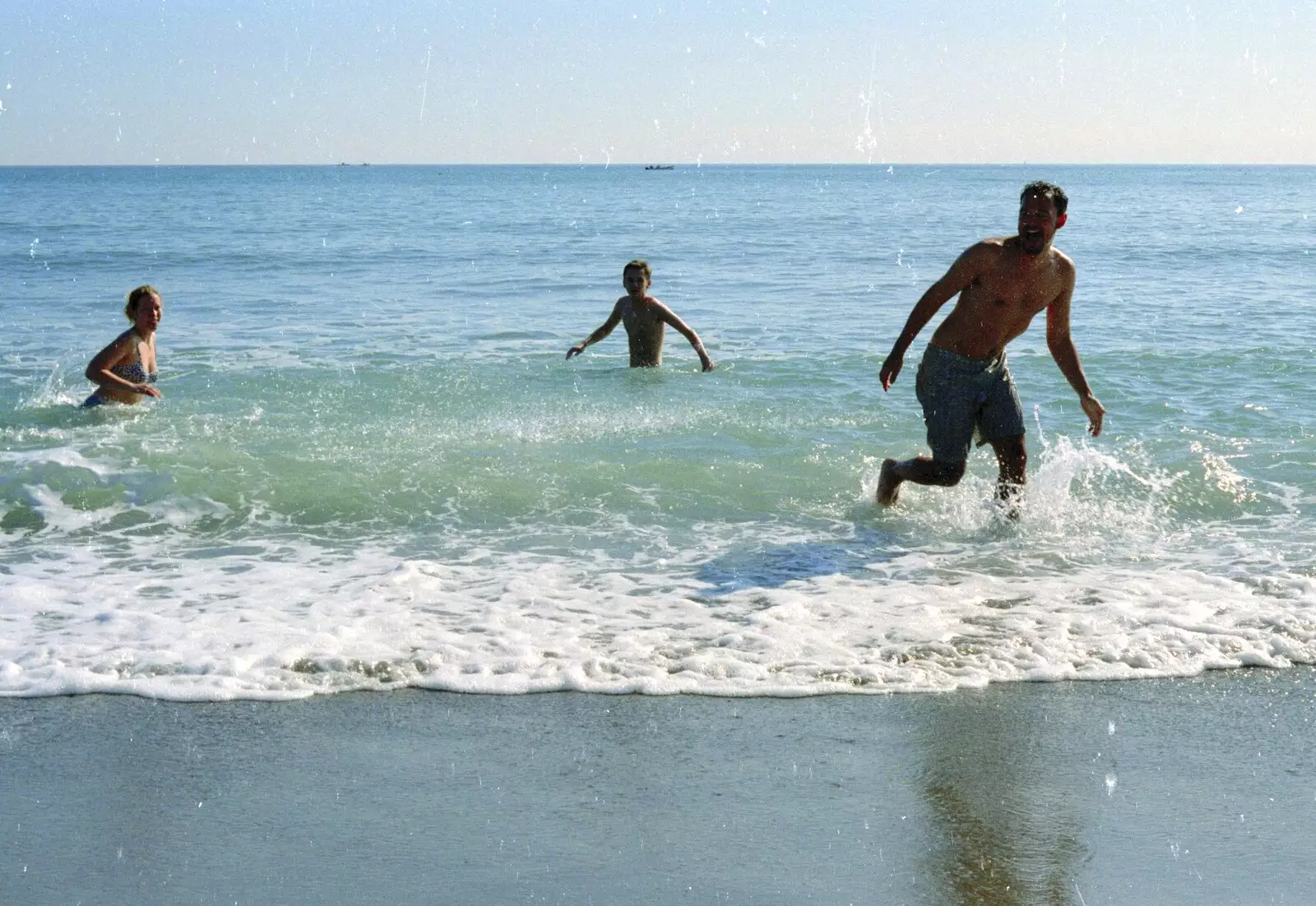 Paul runs out of the sea, from The CISU Massive do Malaga, Spain - November 14th 1998