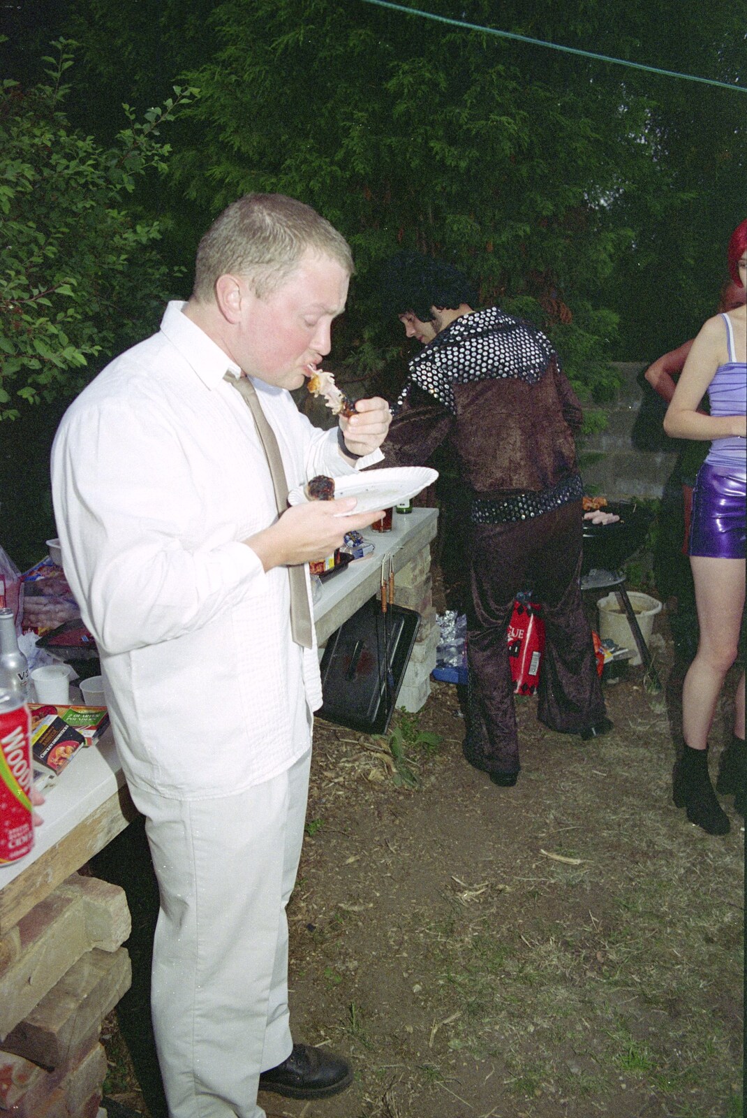 Mark Fox slurps chicken off a bone from "Dave's" CISU Fancy Dress Party, Finbar's Walk, Ipswich - 15th September 1999