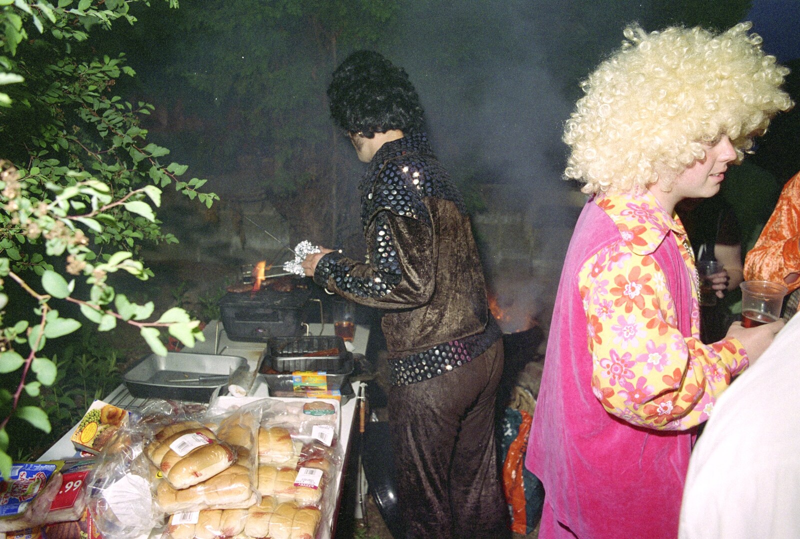 Something's on fire on the barbeque from "Dave's" CISU Fancy Dress Party, Finbar's Walk, Ipswich - 15th September 1999