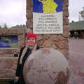 Sis stands behind a stone globe, A Trip to Rovaniemi and the Arctic Circle, Lapland, Finland - 28th November 1999