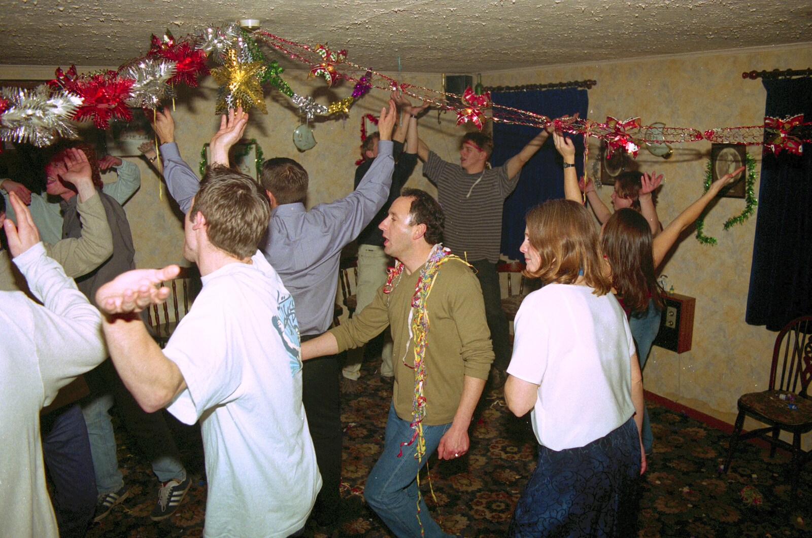 DH joins in the singing, whilst wearing a paper garland from New Year's Eve at The Swan Inn, Brome, Suffolk - 31st December 1999