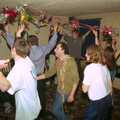 DH joins in the singing, whilst wearing a paper garland, New Year's Eve at The Swan Inn, Brome, Suffolk - 31st December 1999