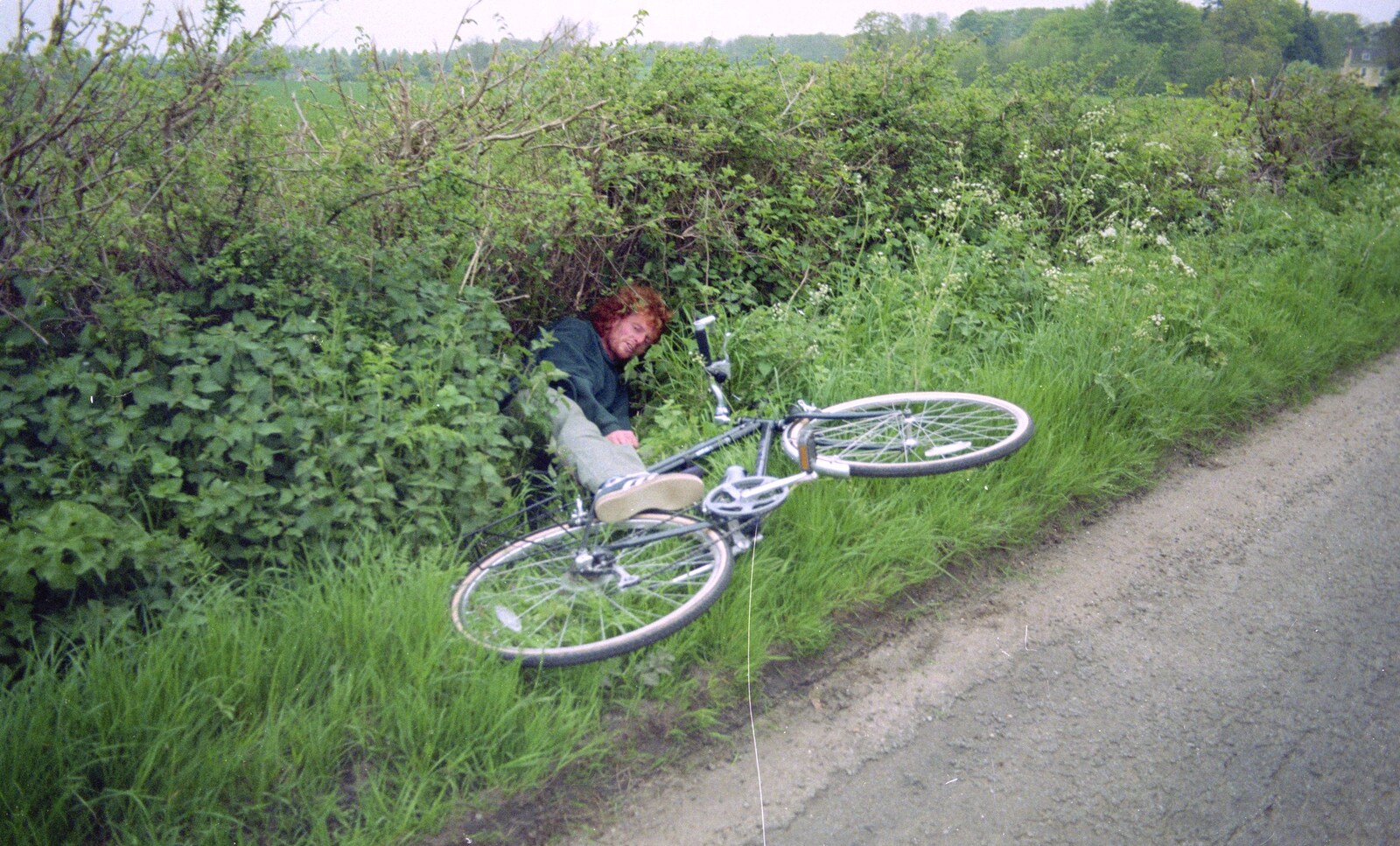 Wavy falls asleep on his bike and ends up in a hedge from A BSCC Bike Ride, Brockdish Greyhound and Hoxne Swan, Suffolk - 4th May 2000