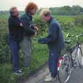 A BSCC Bike Ride, Brockdish Greyhound and Hoxne Swan, Suffolk - 4th May 2000, John Willy lifts Wavy out of the ditch