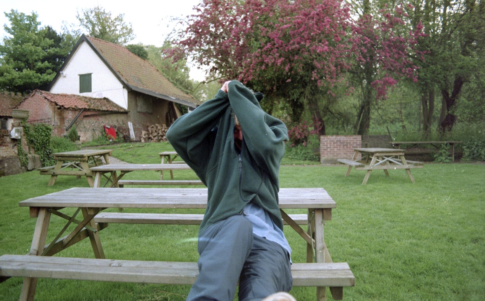 Paul takes his hoodie off from A BSCC Bike Ride, Brockdish Greyhound and Hoxne Swan, Suffolk - 4th May 2000