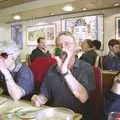 John Willy gets an early beer in on the ferry, A BSCC Bike Ride to Gravelines, Pas de Calais, France - 11th May 2000