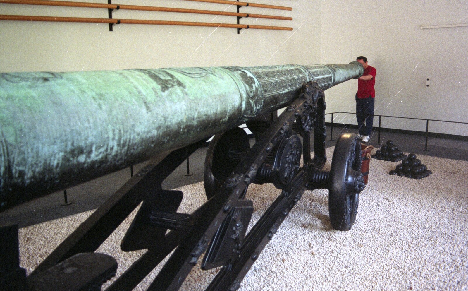 DH looks down the barrel of a very long canon from A BSCC Bike Ride to Gravelines, Pas de Calais, France - 11th May 2000