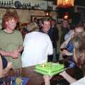 Sylvia hands over a football-themed cake, Wavy's Thirtieth Birthday, The Swan Inn, Brome, Suffolk - 24th May 2000