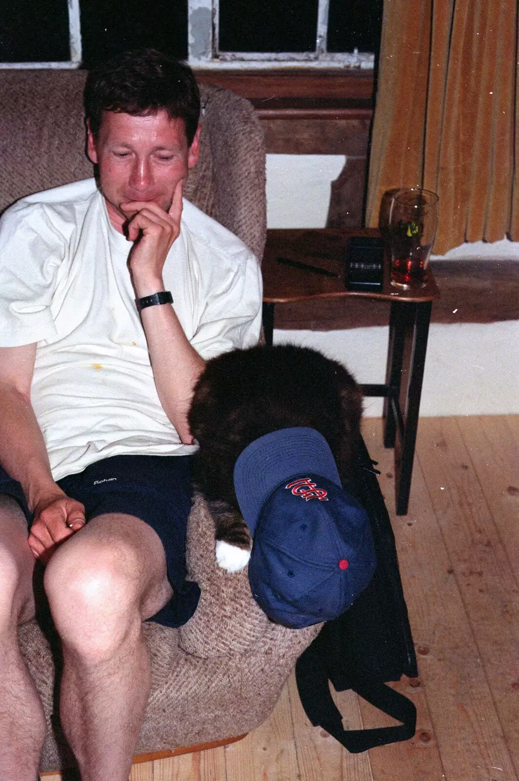 Apple sticks a baseball cap on Sophie the cat, from Wavy's Thirtieth Birthday, The Swan Inn, Brome, Suffolk - 24th May 2000