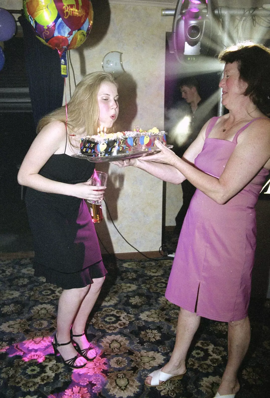 Lorraine blows the candles out, from Lorraine's 21st Birthday, The Swan, Suffolk - 10th June 2000