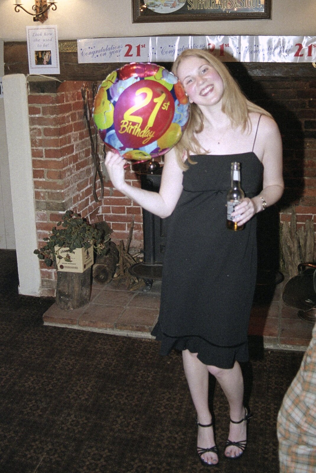 Lorraine with a birthday balloon from Lorraine's 21st Birthday, The Swan, Suffolk - 10th June 2000