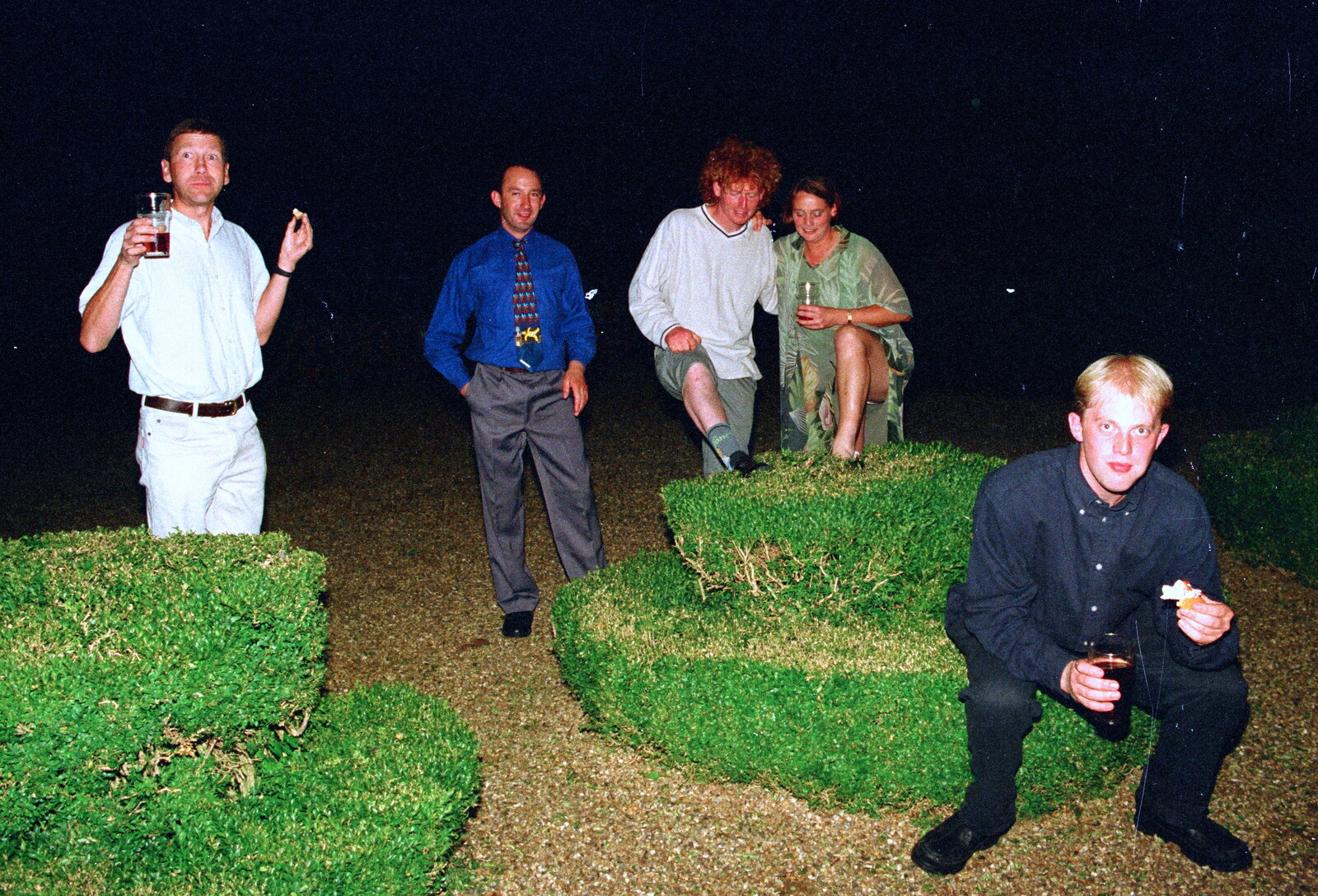 Paul sits on a small topiary hedge from Helen and Neil's Wedding, The Oaksmere, Brome, Suffolk - 4th August 2000
