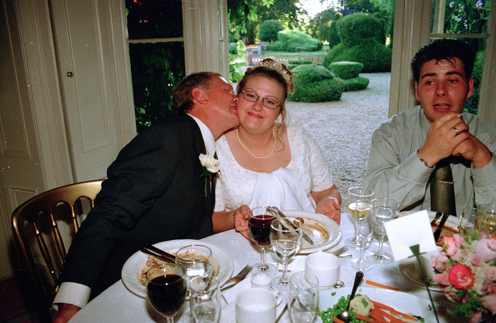 Helen gets another kiss from dad from Helen and Neil's Wedding, The Oaksmere, Brome, Suffolk - 4th August 2000