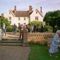 Guests roam around outside the Oaksmere, Helen and Neil's Wedding, The Oaksmere, Brome, Suffolk - 4th August 2000