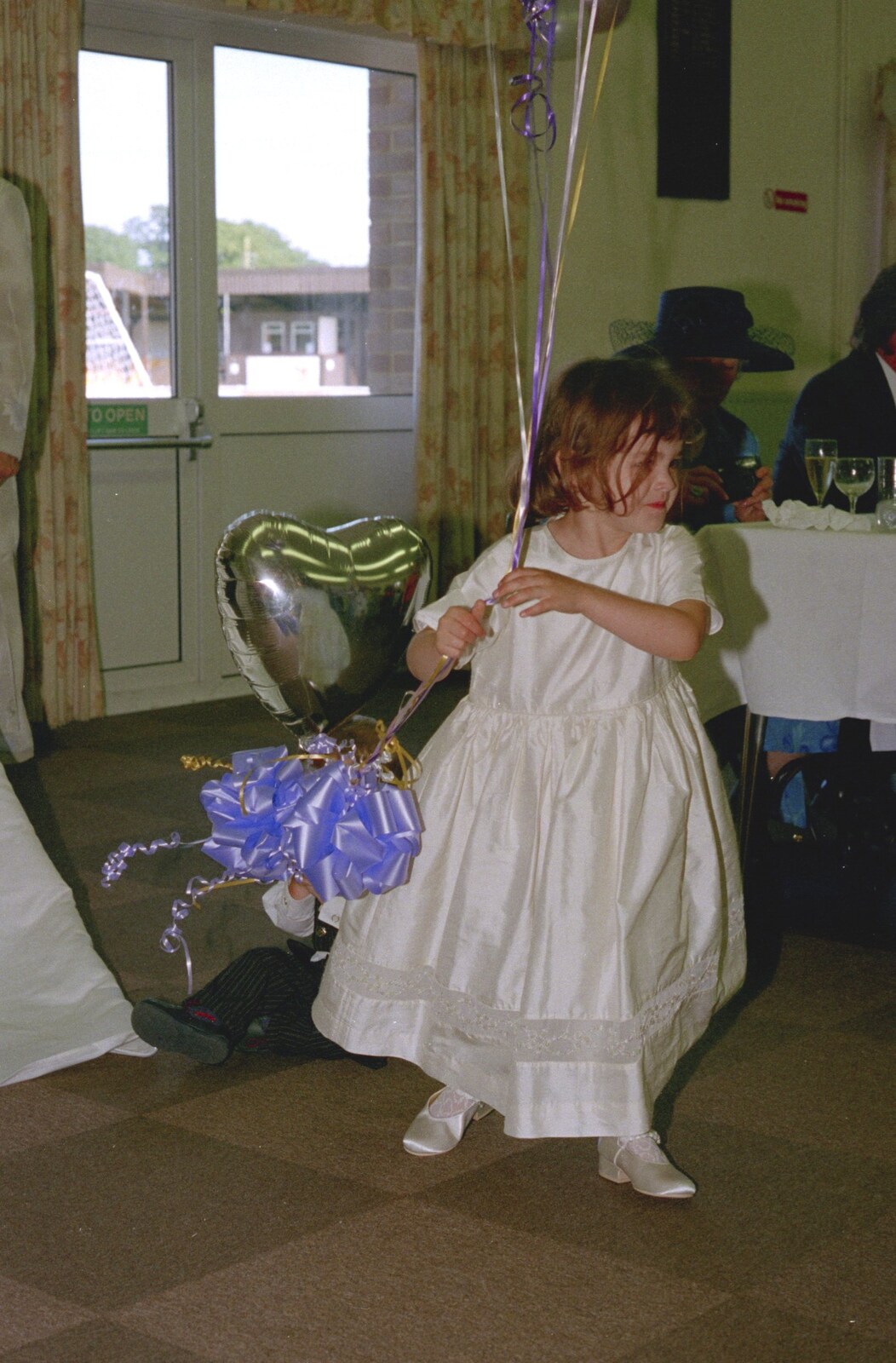 A bridesmaid roams around with balloons from Sean and Michelle's Wedding, Bashley FC, New Milton - 12th August 2000