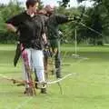 Pauline contemplates her next arrow, Kai's 2nd and a Bit of Archery, Hampshire and Suffolk - 13th August 2000