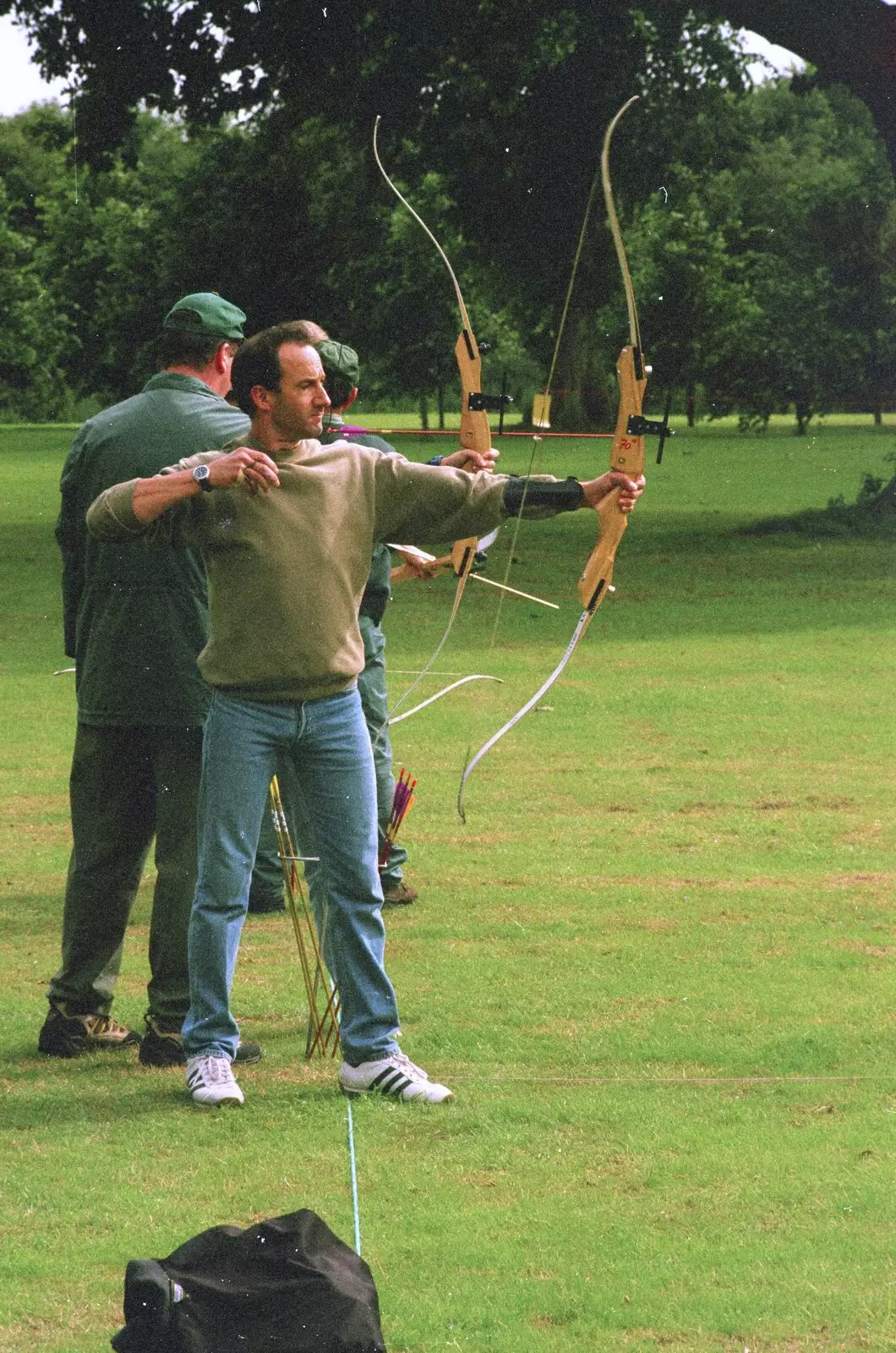 DH lets an arrow fly, from Kai's 2nd and a Bit of Archery, Hampshire and Suffolk - 13th August 2000