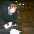2001 At Helsinki airport, Julian tries to stuff a reindeer skin in to his suitcase