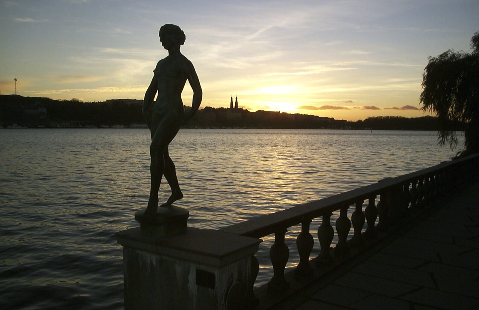 The naked statue in the sunset from A 3G Lab Press Tour of Helsinki and Stockholm, Finland and Sweden - 12th March 2001