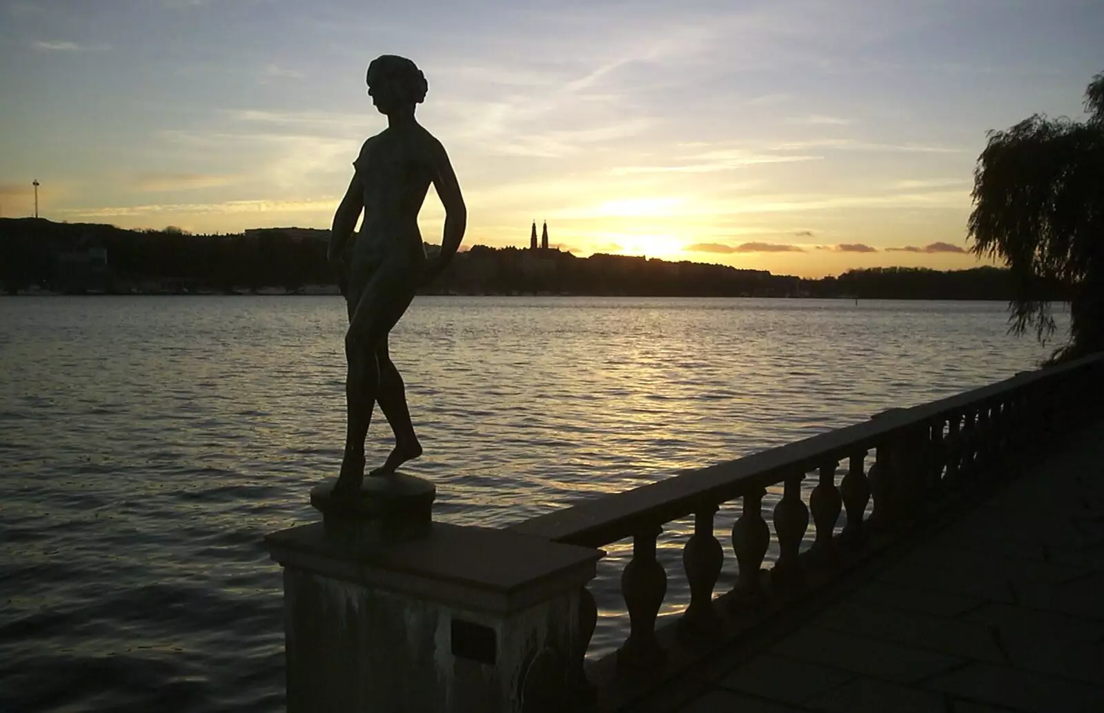 The naked statue in the sunset, from A 3G Lab Press Tour of Helsinki and Stockholm, Finland and Sweden - 12th March 2001