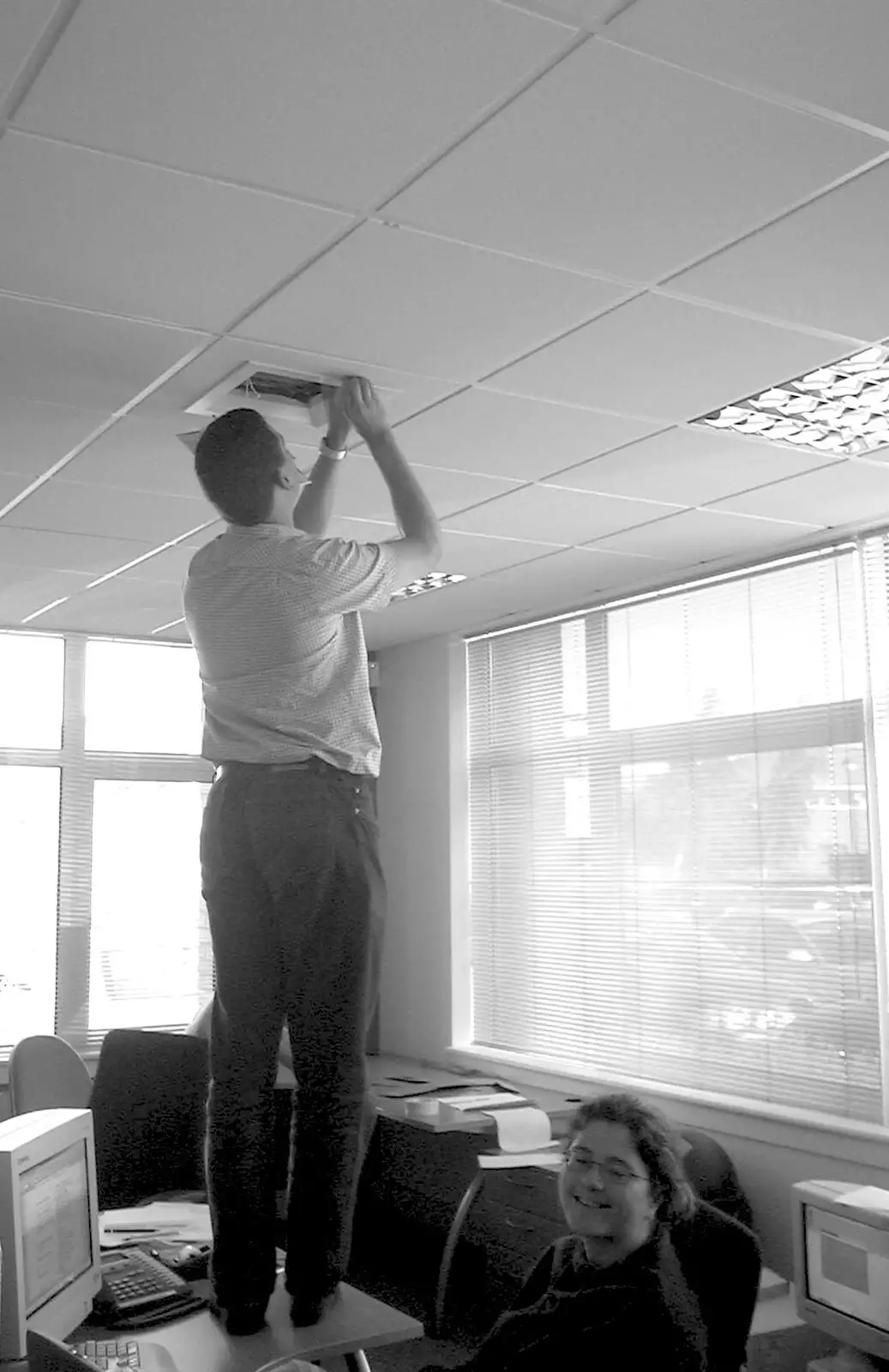 Dave tries to fix the air conditioning, from Genaya's Wedding Reception, near Badwell Ash, Suffolk - 20th May 2001