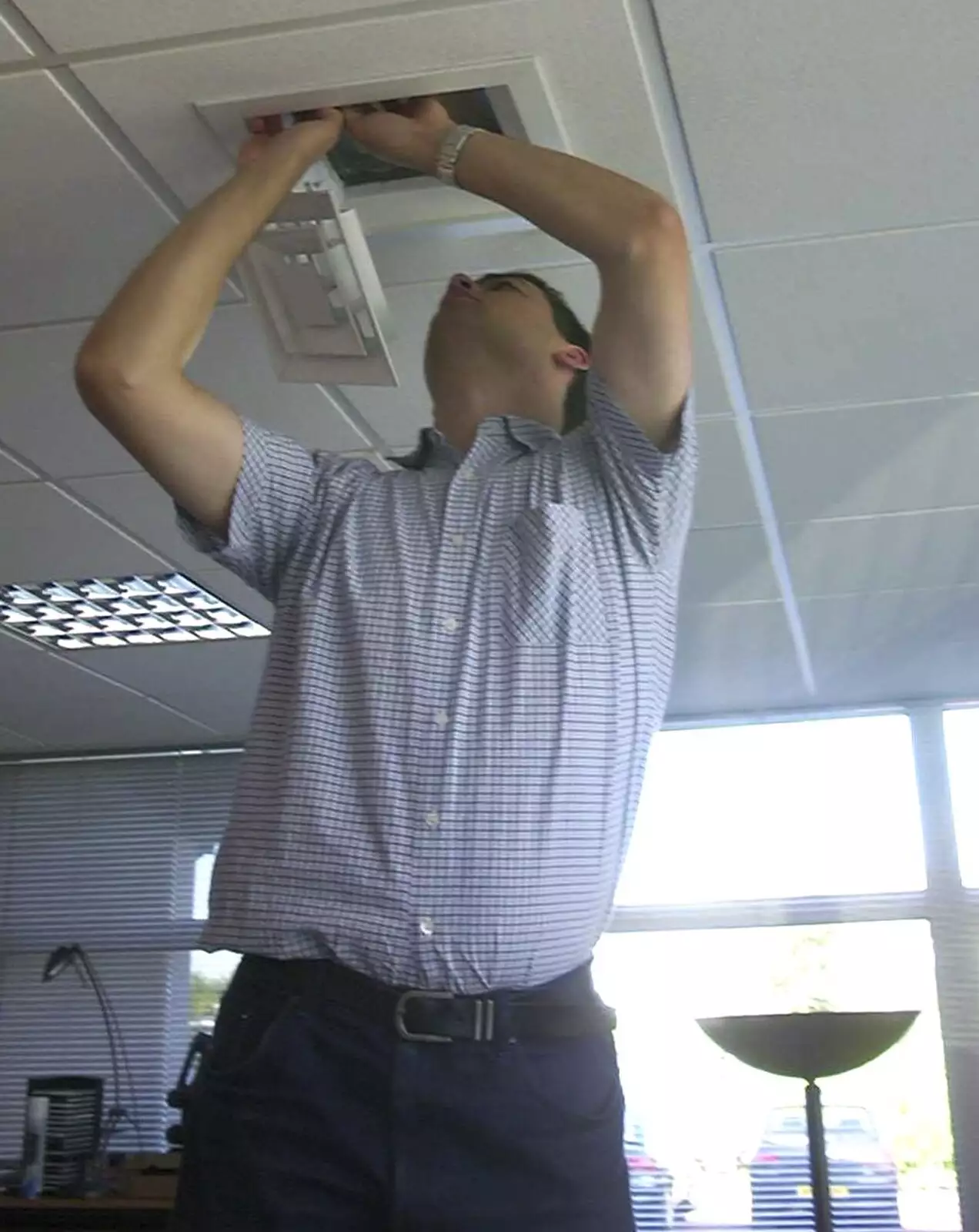 Dave Read adjusts the aircon flow, from Genaya's Wedding Reception, near Badwell Ash, Suffolk - 20th May 2001