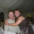 Nosher gets a hug from Mike's missus, Genaya's Wedding Reception, near Badwell Ash, Suffolk - 20th May 2001