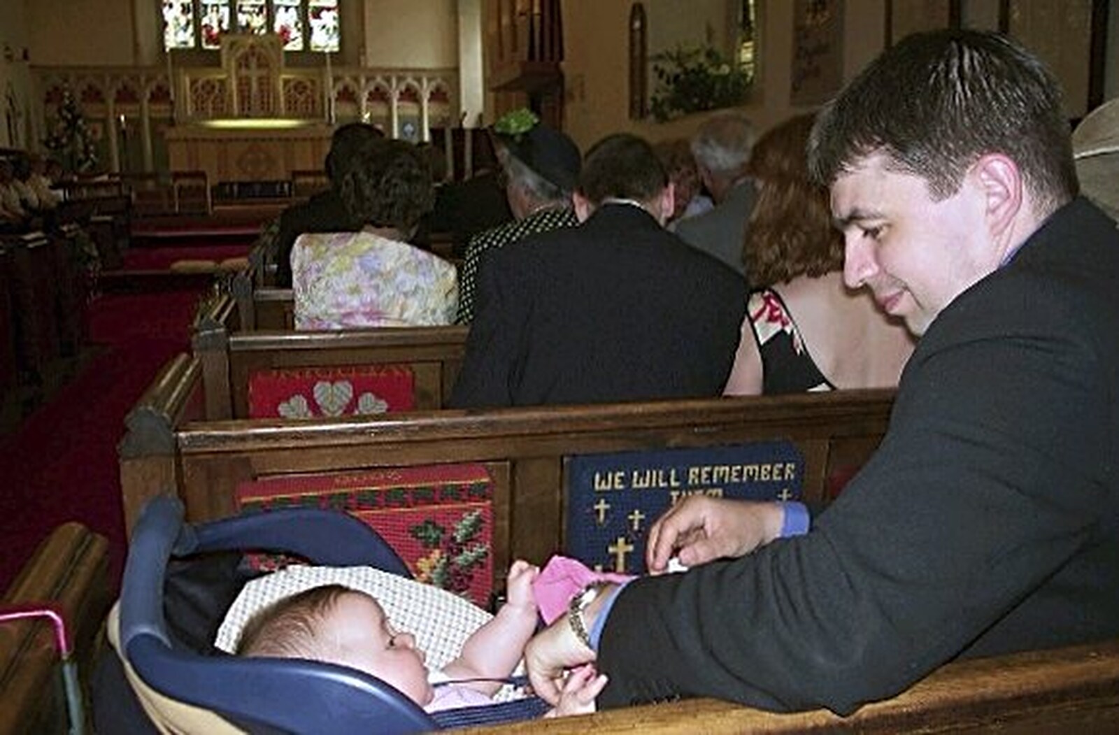Neil, with baby, inside the church from Phil and Lisa's Wedding, Woolverston Hall, Ipswich, Suffolk - 1st July 2001