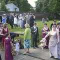 Guests mingle around outside the church, Phil and Lisa's Wedding, Woolverston Hall, Ipswich, Suffolk - 1st July 2001