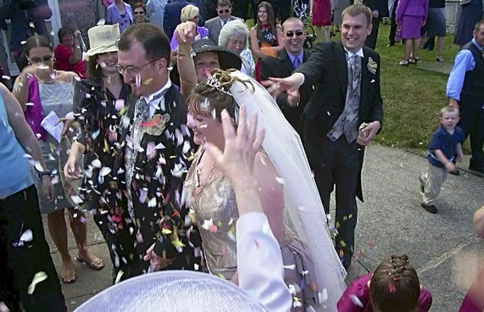 Confetti is thrown, from Phil and Lisa's Wedding, Woolverston Hall, Ipswich, Suffolk - 1st July 2001