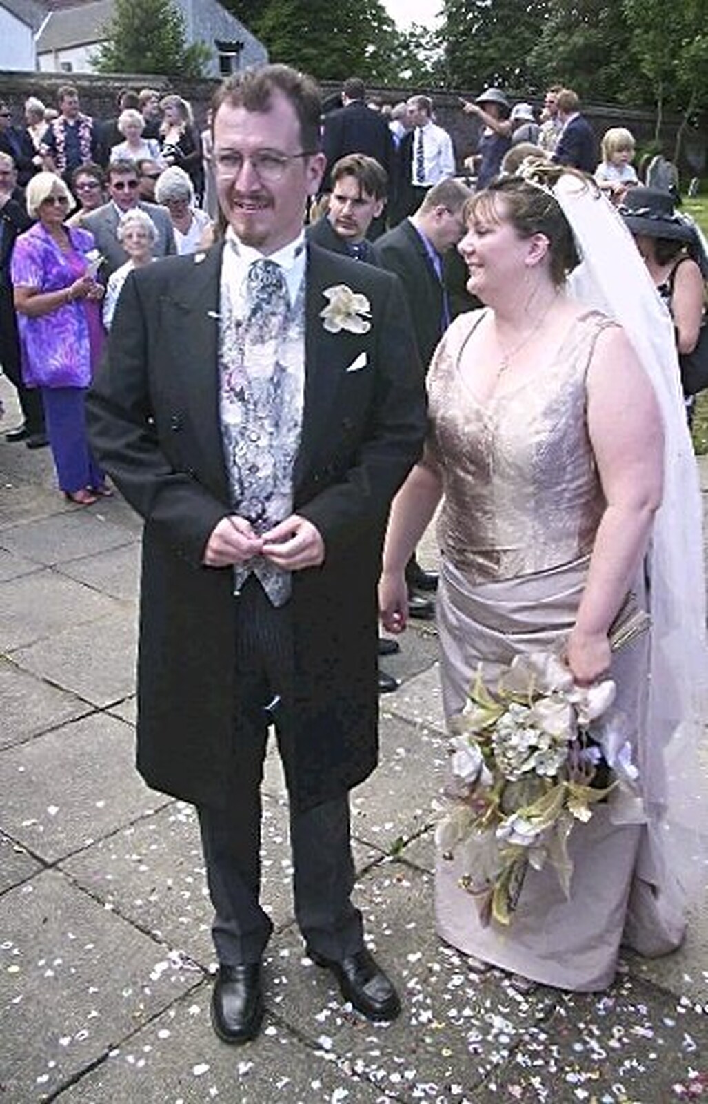 Phil and a pile of confetti on the floor from Phil and Lisa's Wedding, Woolverston Hall, Ipswich, Suffolk - 1st July 2001