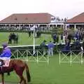 Another horse trots around the parade ring, 3G Lab Goes to the Races, Newmarket, Suffolk - 15th July 2001