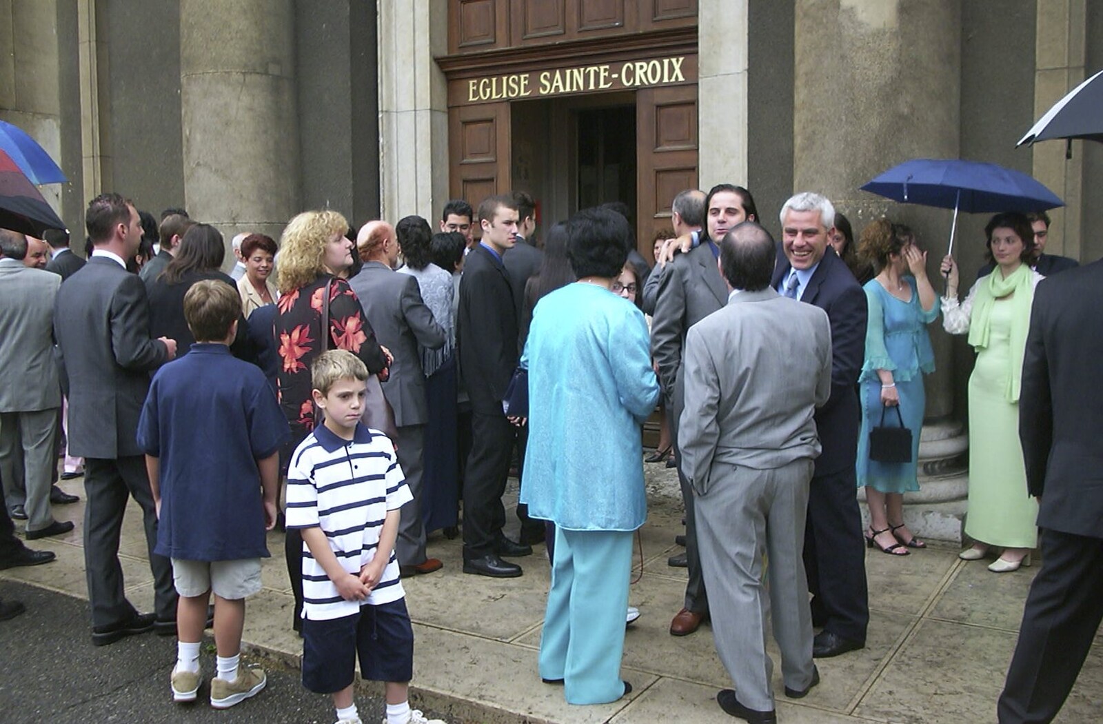 Wedding guests gather outside the church from Elisa and Luigi's Wedding, Carouge, Geneva, Switzerland - 20th July 2001