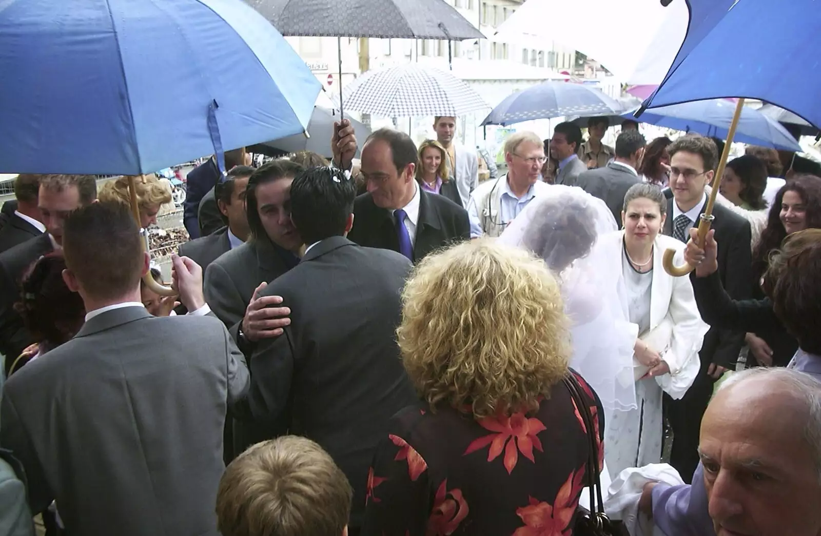 The bride and groom are mobbed outside, from Elisa and Luigi's Wedding, Carouge, Geneva, Switzerland - 20th July 2001