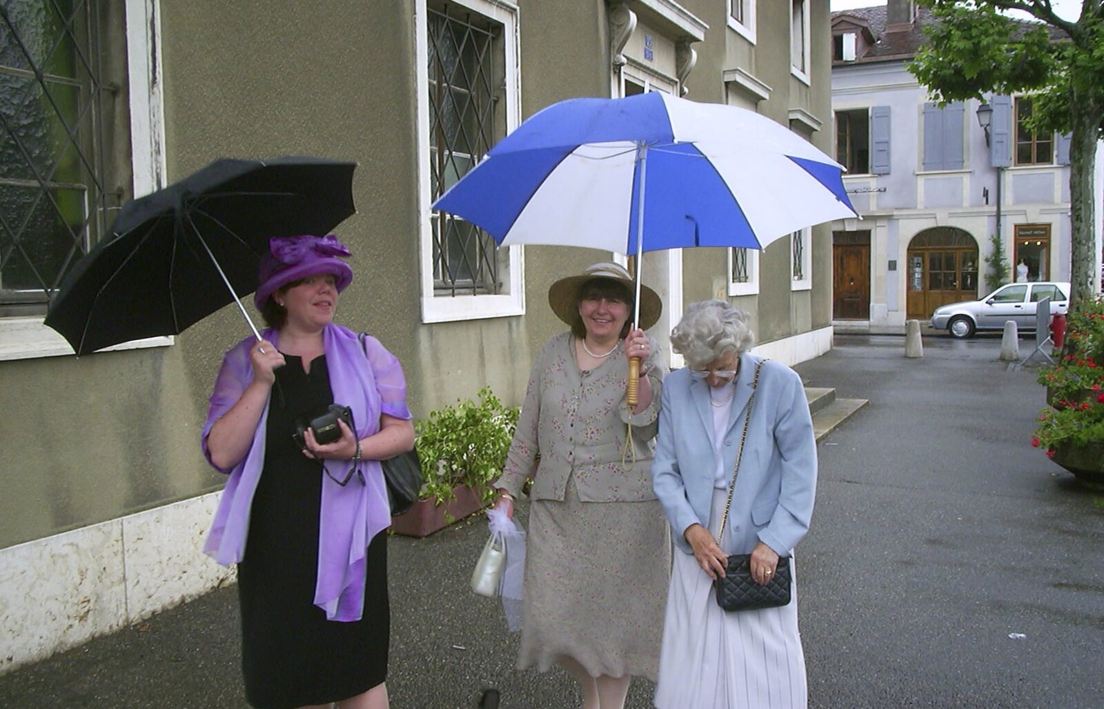 Sis, Caroline and Grandmother in the rain from Elisa and Luigi's Wedding, Carouge, Geneva, Switzerland - 20th July 2001
