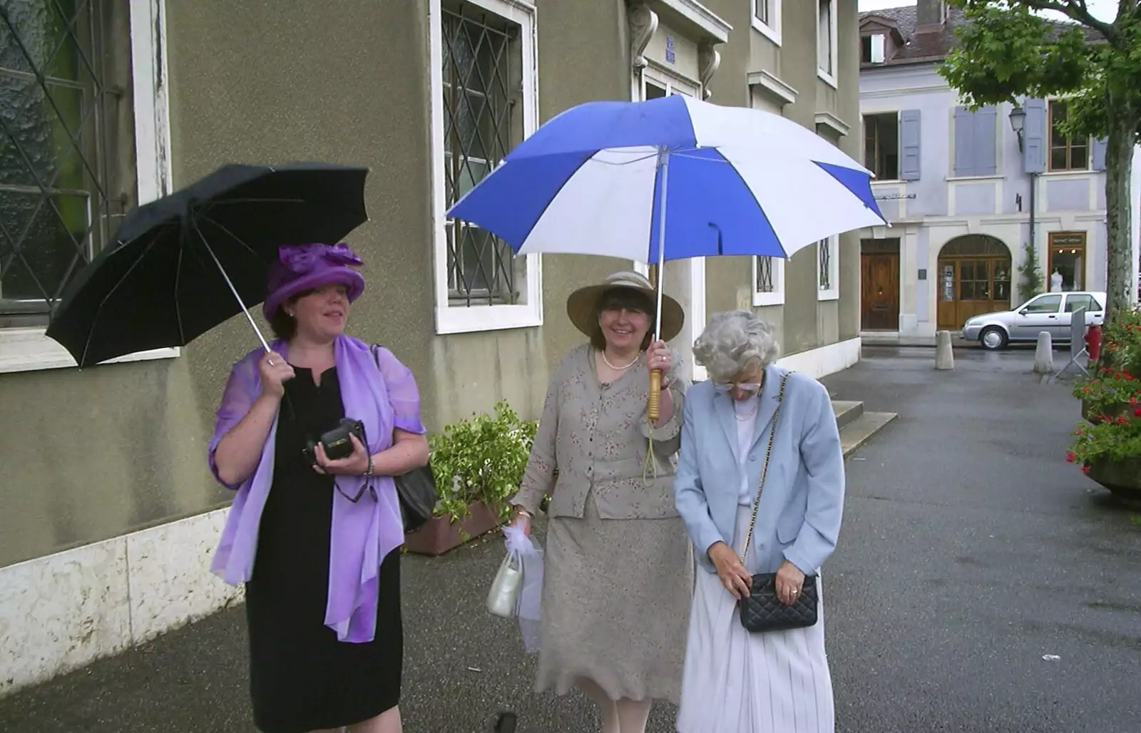 Sis, Caroline and Grandmother in the rain, from Elisa and Luigi's Wedding, Carouge, Geneva, Switzerland - 20th July 2001