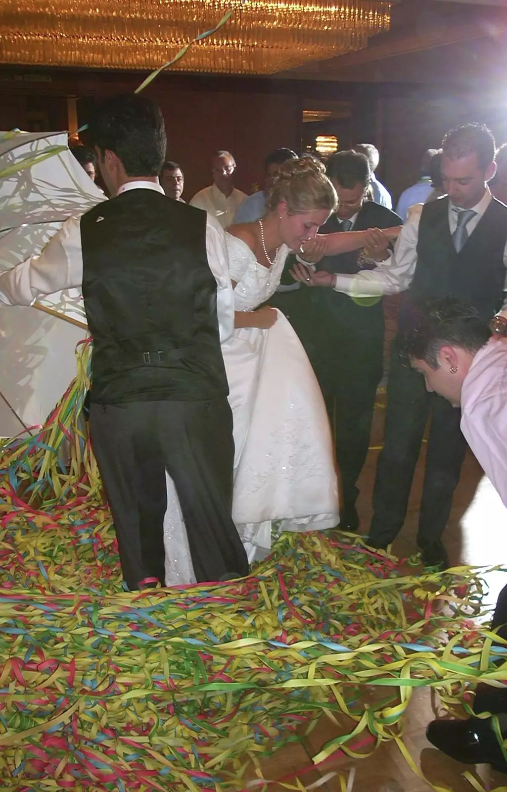 The couple break out of the streamers, from Elisa and Luigi's Wedding, Carouge, Geneva, Switzerland - 20th July 2001