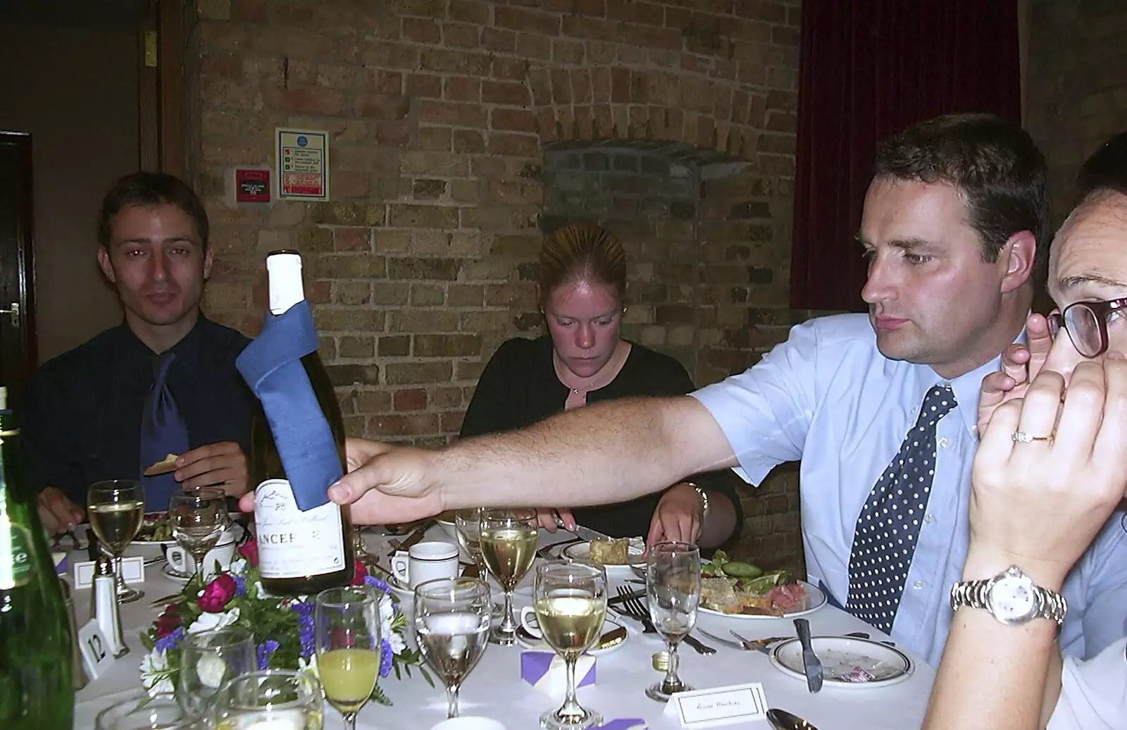 Dan passes some wine around, from Stef and Kath's 3G Lab Wedding, Ely, Cambridgeshire - 28th July 2001