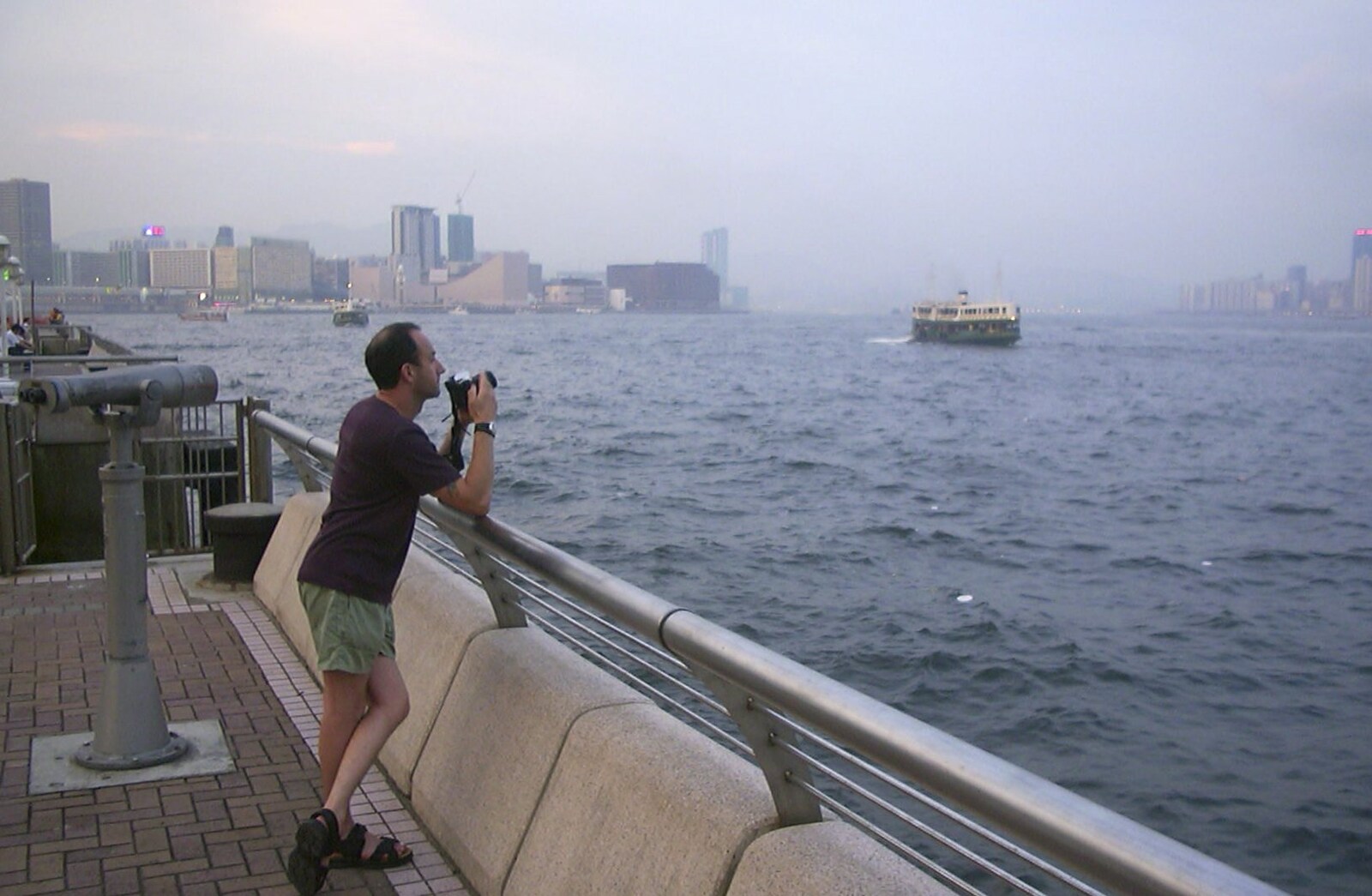 A Trip to Hong Kong, China - 11th August 2001: DH takes a photo in the dusk