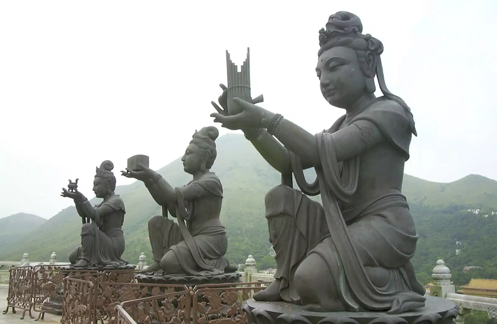 The statues make offerings to Buddha, from Lantau Island and the Po Lin Monastery, Hong Kong, China - 14th August 2001