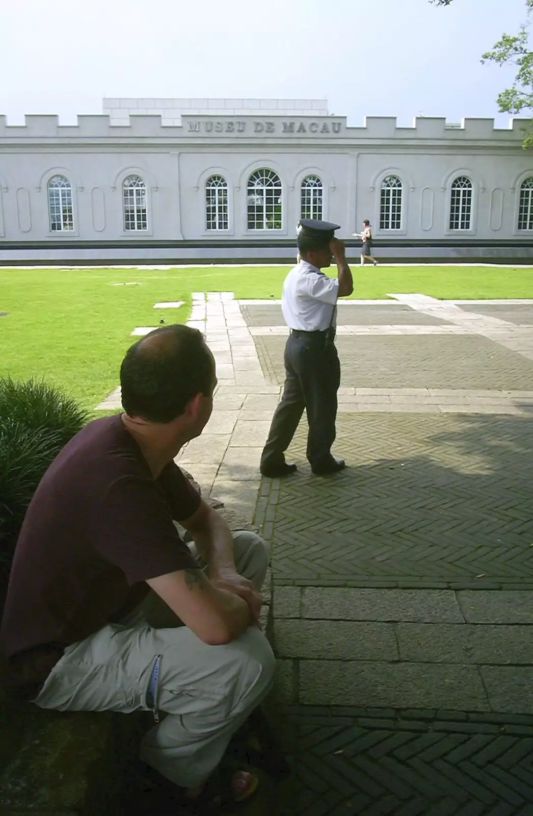 DH watches a security guard wander around, from A Day Trip to Macau, China - 16th August 2001