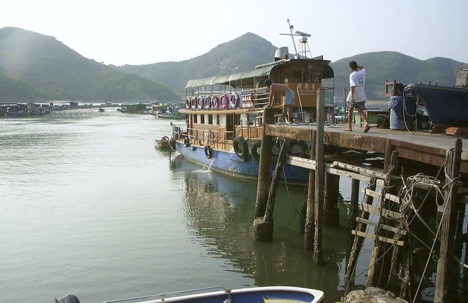 Lamma Island, Hong Kong, China - 20th August 2001: The ferry at the pier