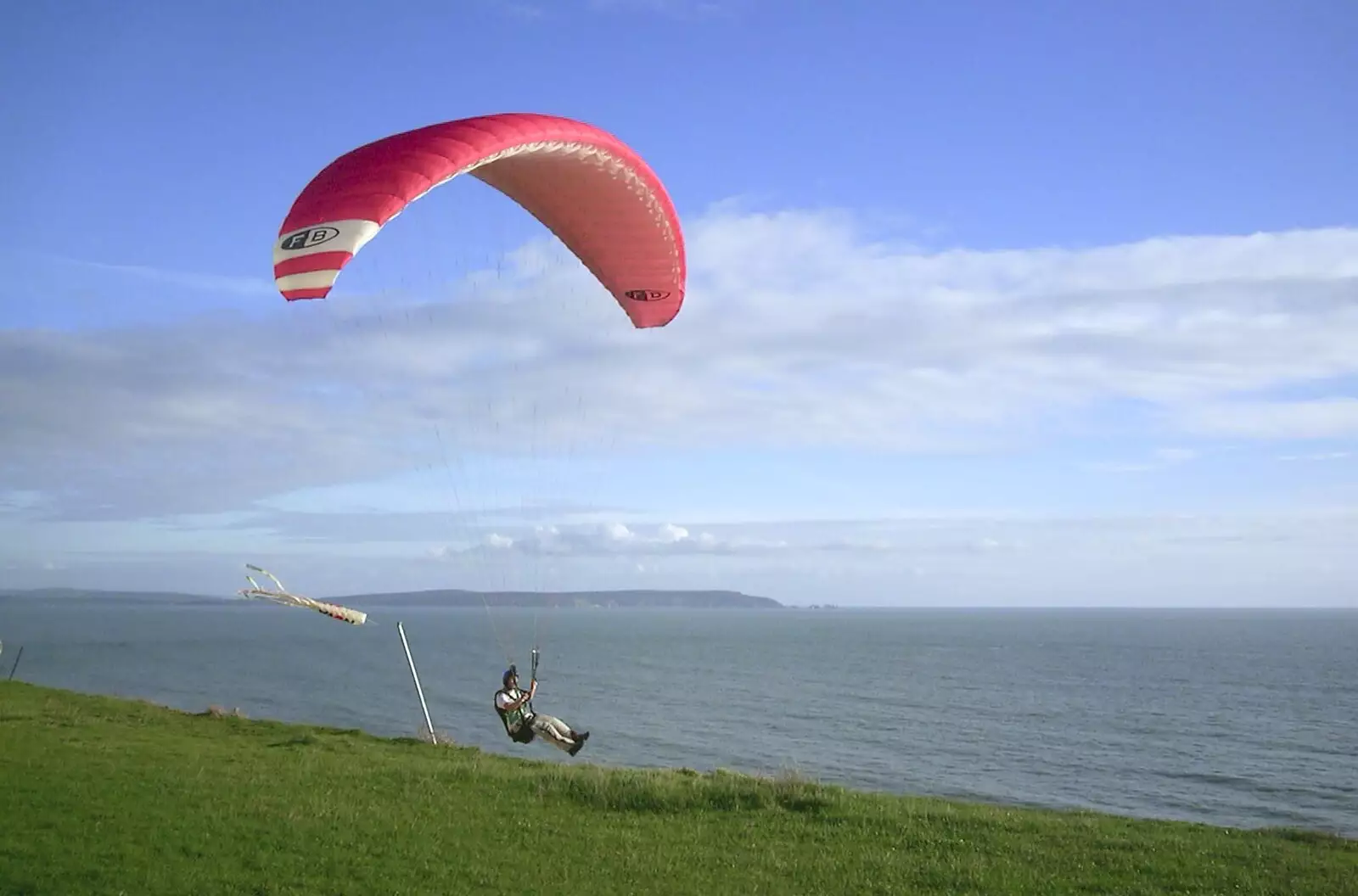 Someone launches off the cliff top, from A Trip Down South, New Milton, Hampshire - 25th August 2001