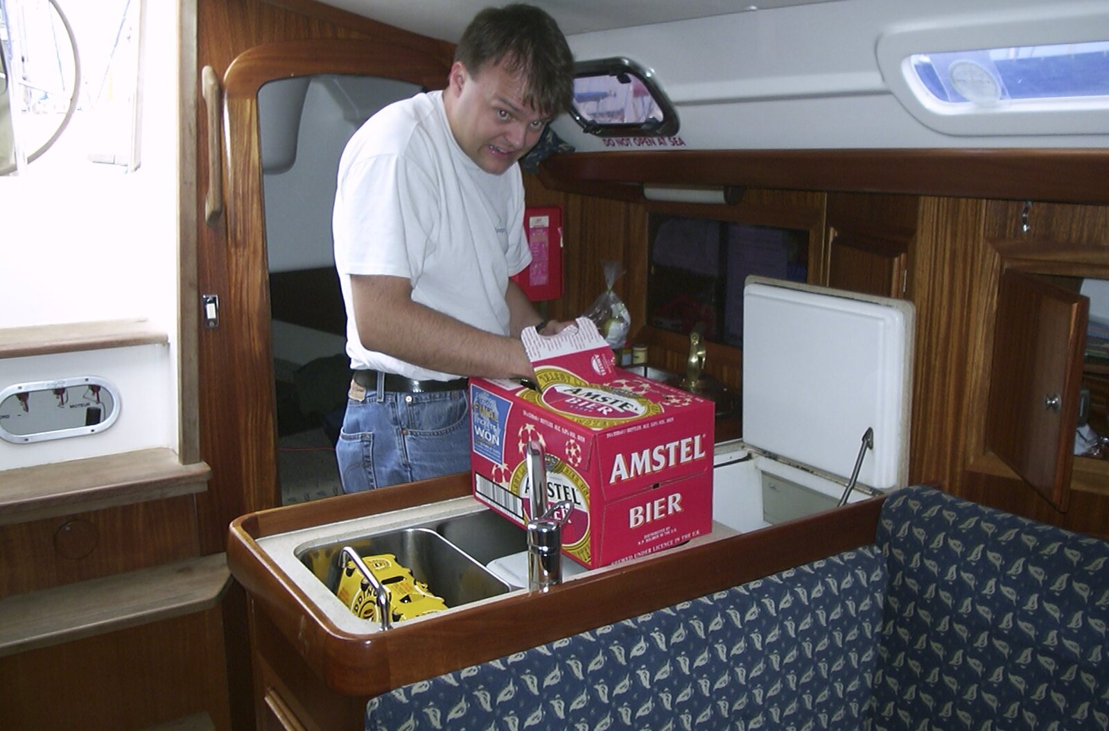 Nick stocks up the boat's frige with beer from A 3G Lab Sailing Trip, Shotley, Suffolk - 6th September 2001
