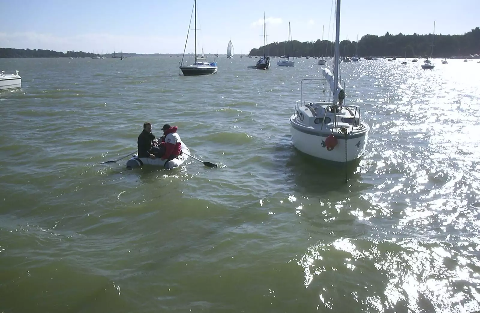 Dan and Gerard row off to Pin Mill for supplies, from A 3G Lab Sailing Trip, Shotley, Suffolk - 6th September 2001