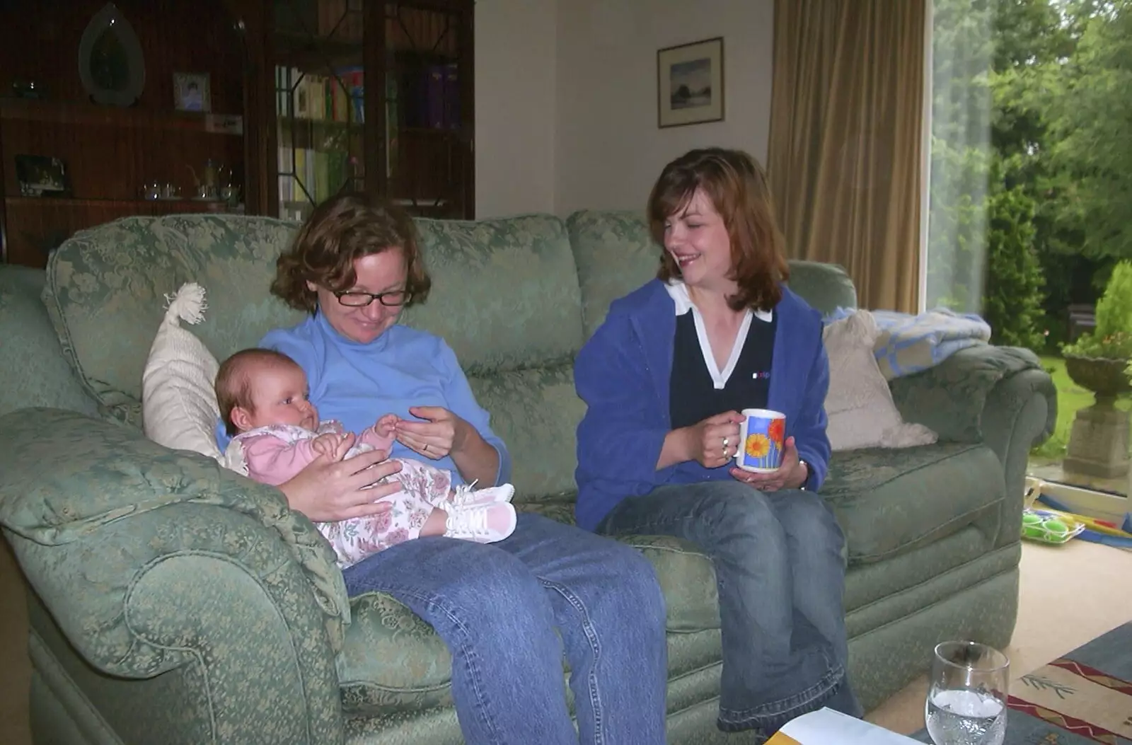 Lolly has a go of the baby, from Sean's New Sprog, New Milton and Hordle, Hampshire - 12th September 2001